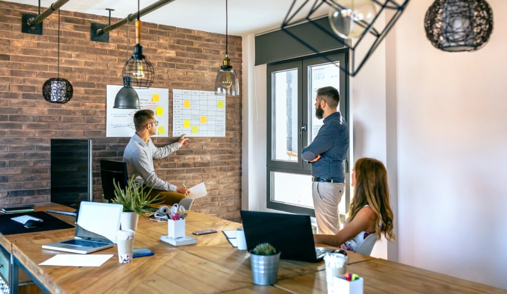 Manager organizing work in an office